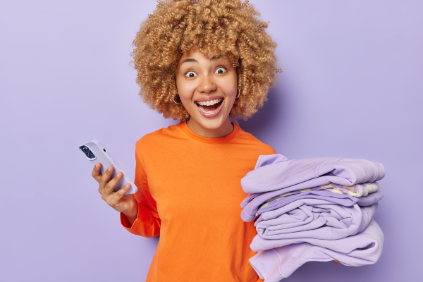 Woman Excited About Special Offer On A Lavendar Background